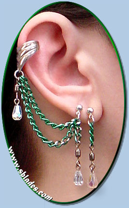 Single-pierced style shown w/cuff, green chain & clear AB teardrops