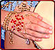 Amira Hand-Star jewelry gold-tone w/all ruby red beads. Shown w/Hexmaile armlets (Headdress + top may be available upon request)
